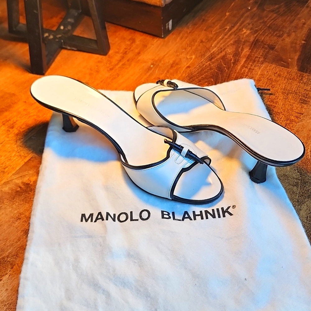 Manolo Blahnik White Kitten Heels with Black Piping and Detailing.